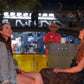 Friends-enjoying-Riverwalk-boat-tour-at-night